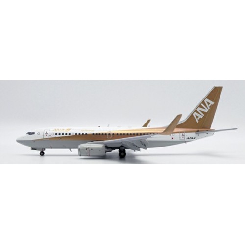 JCEW2737001 - 1/200 ALL NIPPON AIRWAYS BOEING 737-700 GOLD REG: JA01AN WITH STAND